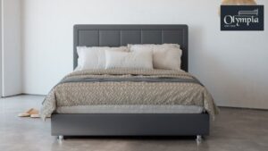 מיטה זוגית 140x190 דגם 6012 עץ מרופדת דמוי עור כוללת ארגז מצעים + מזרן קפיצים מתנה מבית Olympia - צבע אפור